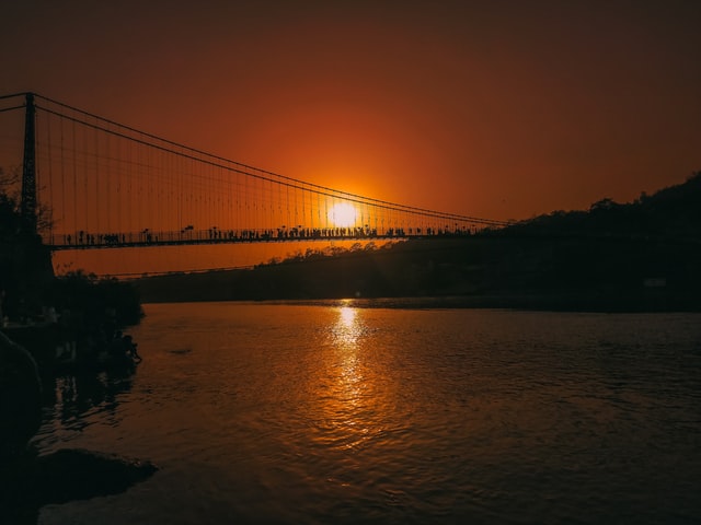 Ram Jhula bridge with sunsetting in the background